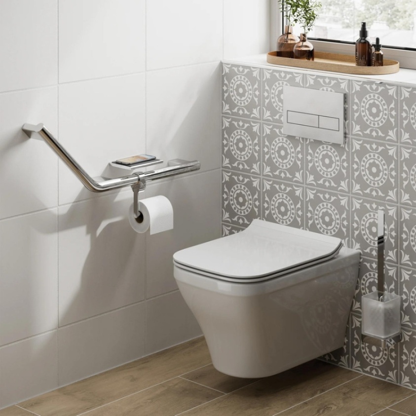 Product Lifestyle image of the left handed HIB Angled Grab Rail with Toilet Roll Holder and Shelf